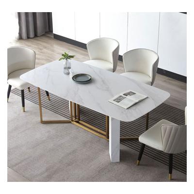 China (Other) Luxury Simple Italian Adjustable SLATE Dining Table Stainless Steel Dining Table And Chair Combination Light for sale