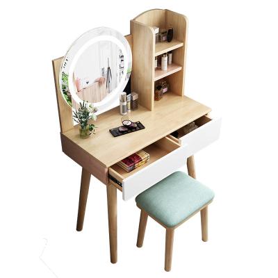 China Customized Nordic simple lightweight luxury bedroom dresser storage cabinet dressing table girl makeup table with led light mirror for sale