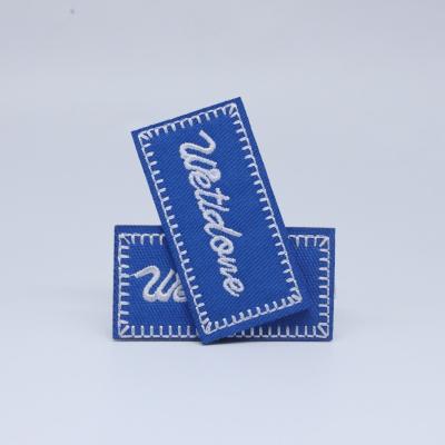 China Washable Customized Embroidered Woven Label Label For Clothing for sale