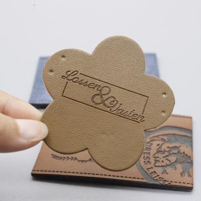 China Good quality and fashion CLOTHING china jeans metal PU metal leather label custom clothing pu jeans leather label for sale