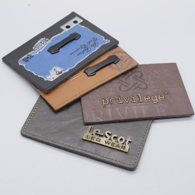 China PU Garment Label Clothing Brand Jeans Metal Custom Logo Leather Label PU Leather Label Customized Logo Tags For Clothes for sale