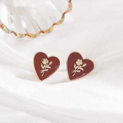 China FASHIONABLE Red Stud Earrings Female Cute Korean Oil Rose Drop Heart Earrings for sale