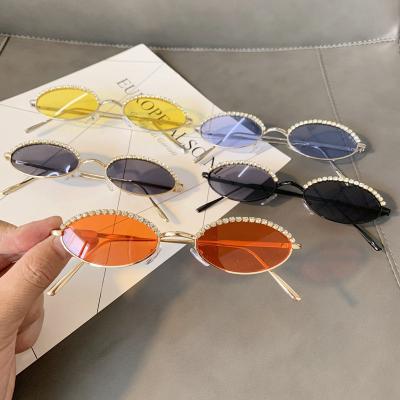 China Custom 2021 Fashion Sunglasses Luxury Oval Sun Glasses Small Vintage Rhinstone Glass Shades Metal Sun Glasses for sale