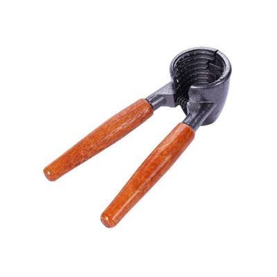 China Durable Heavy Duty Nutcracker Pecan Nut Tongs Opener Tool With Wooden Handle for sale