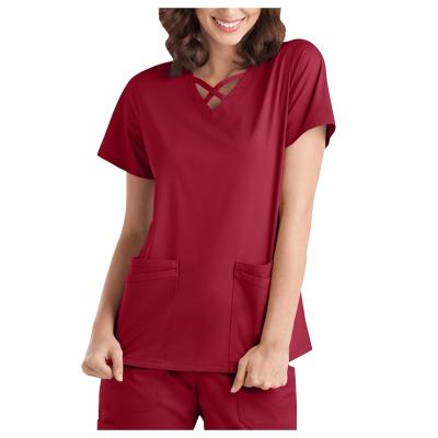 China New Style Hospital Textile Fabric Europe Standard Pocket Wonderwink 2 Soft V-neck Scrub Tops For Nurse for sale