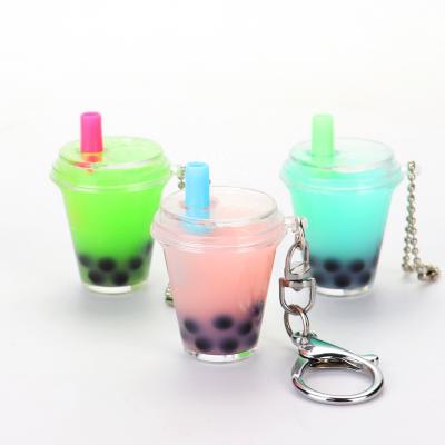 China Home Decoration Liquid Bottle Key Chain With Key Chain Acrylic Liquid Cup Liquid Filled Key Chain for sale