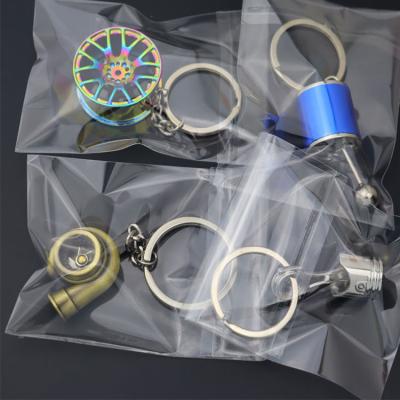 China Fashionable Printing Your Logo Key Accessories Cool 3D Car Parts Turbocharger Metal Turbo Whistle Key Chain Key Chains for sale