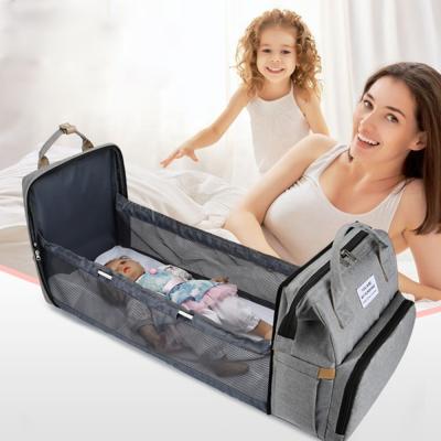 China With USB 2021 Baby Backpack Waterproof Foldable Bed Mother Baby Bags Mommy Travel Relaxing Diaper Bags Backpack for sale