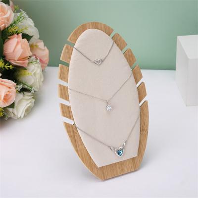 China Morden new single window display props can be disassembled bamboo jewelry display stand necklace display stand for jewelry for sale