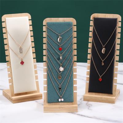 China Creative Morden New Window Props Custom Wooden Display Bracket Jewelry Display Stand for sale