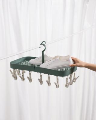 China Cutie Dotey Viable Foldable Clothes Hanger Collapsible Foldable Hangers for Fabrics for sale