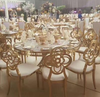 China Antique furniture new fashion gold metal stainless steel flower design royal chair for hotel wedding for sale