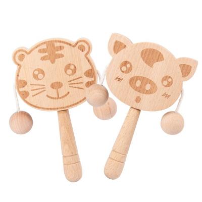 China Children's toys cartoon solid wood rattle that can bite and shake hands, double sided animal shaped traditional toys for sale