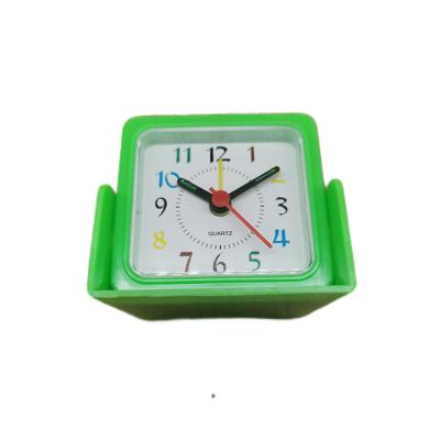 China Mini small modern plastic folding alarm clock for children s day gift for sale