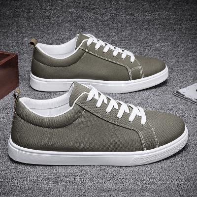 China Fashion Trend Fashion Fabric Wholesale Canvas Sneakers For Men's Running Shoes Manufacturing Casual Sneaker for sale