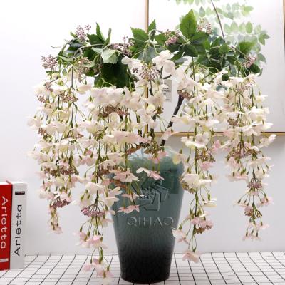 China QiHao 127cm 3 Stems Artificial Wisteria Flowers Hanging Vine Table Wedding Decoration for sale