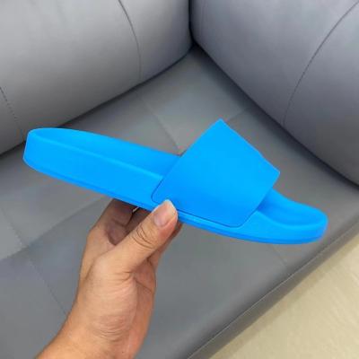 China Cushioning Bathroom Pvc Custom Logo 3D Rubber Embossed Sliders Blue Slippers Customize Formen's Alipplers Slides for sale