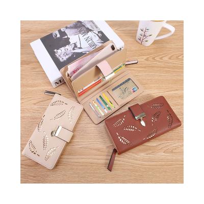 China Fashion Long Waterproof Clutch Bag Hollowing Out Leaf Zipper Sequined Decorative Latch Women Clutch Leather Wallet for sale