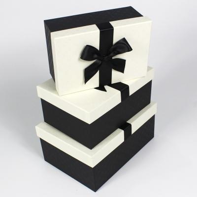 China Handmade rectangle shaped cardboard box lined with black ribbon for sale