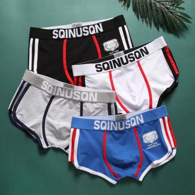 China Anti-Static Mens Underwear Ice Silk Breathable Mesh Boxer Shorts Slim Seamless Boxer Shorts In Stock for sale