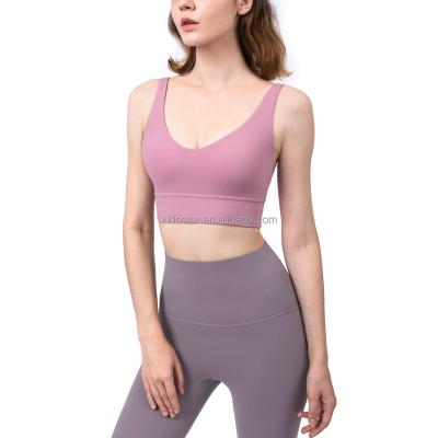 China Breathable beautiful new skin-friendly nude bra deep V back charm gather yoga underwear fitness vest for sale