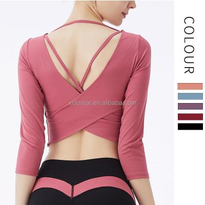 China Beautiful Cushion Long Sleeve Yoga Back Middle Back Sportswear Ins Style Breathable Gym Women's Short Top for sale