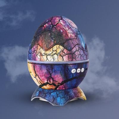 China Music Night Dinosaur Egg Home Light Led Night Lights Projection Speaker Music Mini Starry Blue-tooth Smart Star Projector for sale