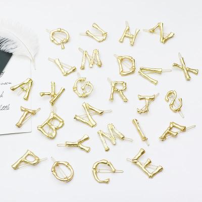 China Hot Sale 26 Alloy C&J Alphabet Gold Plated Simple Geometric Word Hair Clips Acetate Letter Hair Clips for sale