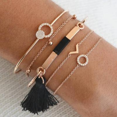 China Newcomer FASHIONABLE C&J Euramerican Wind Vogue National Circle Full To Drill V Word Tassel Bell 5 Piece Bracelet for sale