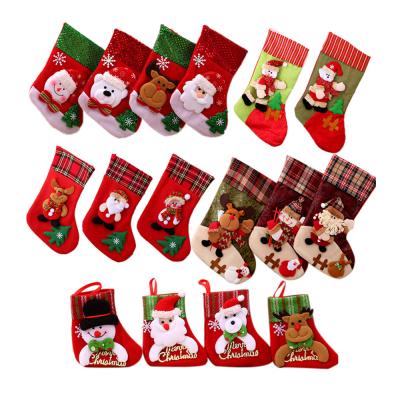 China Fashionable Variety HU-225 Polyester Christmas Tree Candy Bag 3D Santa Fireplace Luxury Christmas Stocking for sale