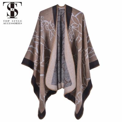 China Soft Feeling 2022 Ladies Smooth Cable Knit Wrap Shawl Soft Tassel Fringe Poncho Sweater Scarves for sale