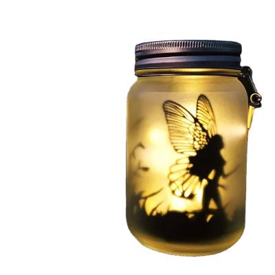 China Outdoor Dropping Shipping Hot Christmas Decorative Solar Mason Jar Outdoor Hanging Fairy LED lights Butterfly Angle for sale