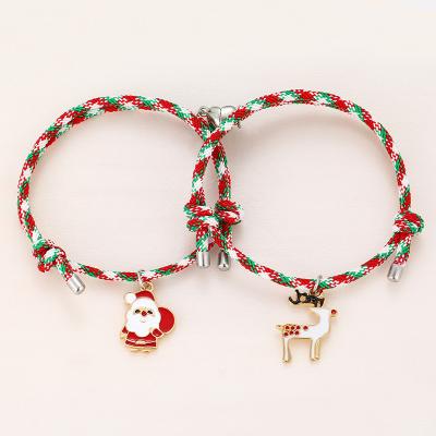 China 1 Pair Christmas Bracelets Other Santa Claus Elk Pendant Love Heart Magnet Attract Couples Bracelet Gift Bangle Christmas Jewelry for sale