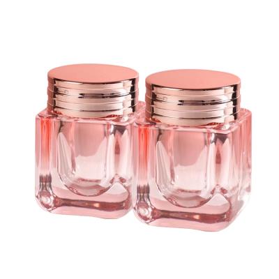 China Customized 2021 50g translucent pink cosmetics latest design luxury cosmetic jar for sale