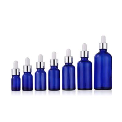 China Euro 5ml 10ml 15ml 20ml 30ml 50ml 100ml Round Cosmetic Blue Glass Dropper Bottle Essential Oil Bottle for sale