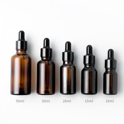 China 5ml 10ml 15ml 20ml 30ml 50ml 100ml Essential Oil Cosmetic Serum Amber Glass Dropper Bottle With Black Pipette for sale