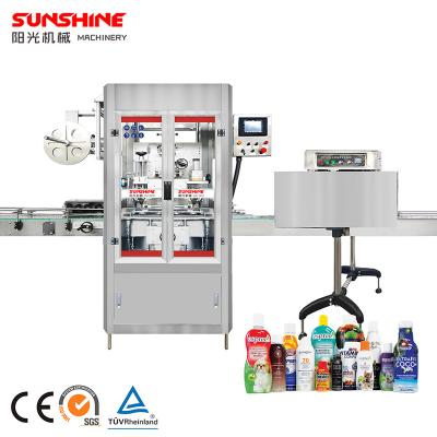 China High Speed ​​Automatic Mineral Shrink Sleeve Label Applicator PVC Water Bottle Food Beverage Labeling Machine With Heat Tunnel for sale