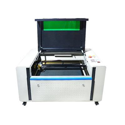 China Foam Plastic Textile Paper Mdf Leather Acrylic Wood Fabric Cnc Co2 Laser Cutting Engraving Machine for sale