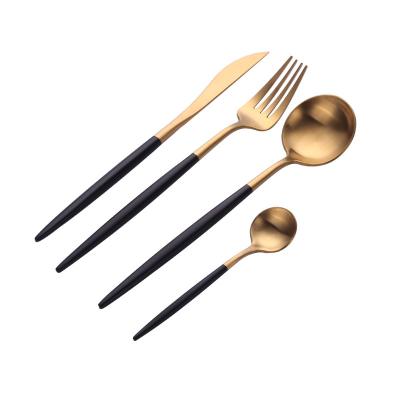 China 304 Wholesale Viable Western Tableware Black Gold Primary Color Steak Knife Fork And Spoon Set for sale