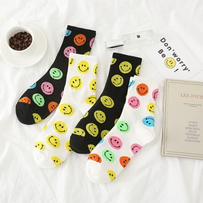 China QUICK DRY Happy Medium Tube Stockings Cute Smile Women Socks For Women for sale