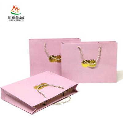 China Recyclable Wholesale Custom Flower Packing Jewelry Ad Wine Logo Packaging Package Gift Shopping Pink Paper Bag for sale