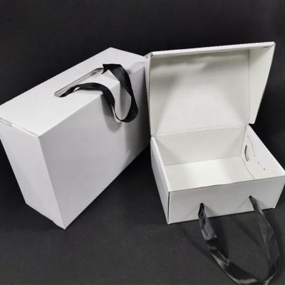 China Recycled Luxury White Foldable Baby Shoe Packaging Materials Kids Cheap Simple Cardboard Boxes Shipping Cardboard With Handle for sale