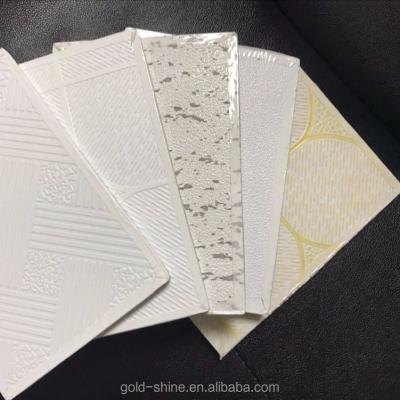 China Factory Supply Artistic Ceilings PVC Fireproof Gypsum Paper Laminated Fake Ceiling Tiles for sale