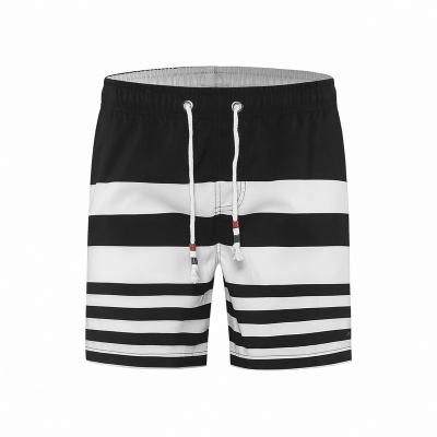 China Anti-Wrinkle OEM Custom Design Logo Digital Printed Boardshorts Men Surfing Board Shorts Beach Shorts Swim Trunks For Men With Mesh Lining for sale