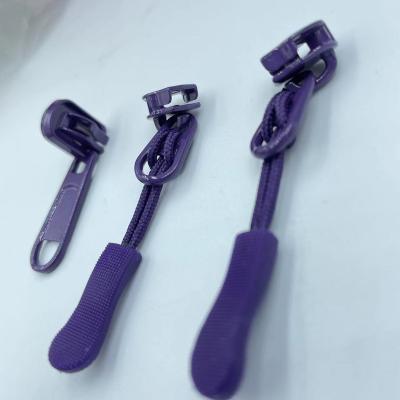 China High quality colorful nickel free zipper pullers are suitable for all kinds of luggage zippers for sale