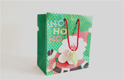 China Gloss 180gsm Art Paper Chrismas Holiday Paper Bags With Flowers Printed for sale