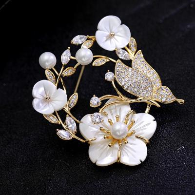 China Wholesale Luxury Natural Charare Brooch Flower And Butterfly Zircon Pearl Shell Copper Brooch For Women for sale