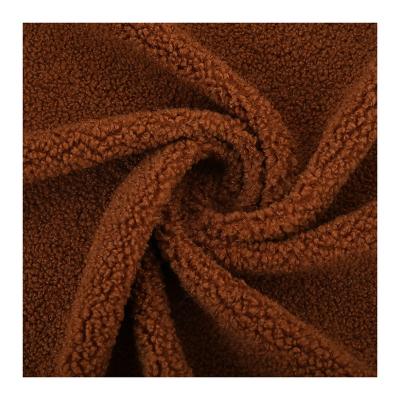 China Sustainable Home Decoration Plain Dyeing Weft Polyester 100% Teddy Fleece Fabric For Toys for sale