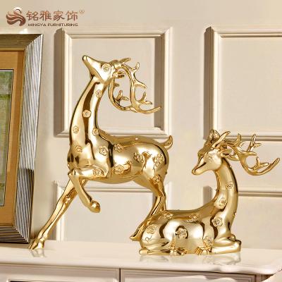 China Wholesale Decorative Europe Resin Gold Deer Figurines For Christmas Ornament Decoration for sale