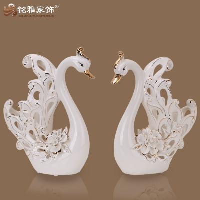 China Europe wedding gift crafts ceramic swan figurines for table decoration for sale